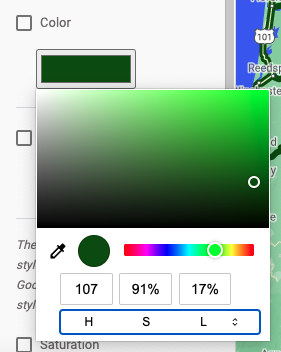 一张屏幕截图，详细展示了颜色选择器的界面。顶部是一个矩形的饱和度和亮度选择器；其下方是一个较小的色调选择器，显示红、紫、蓝、绿、黄、橙各种颜色的光谱。再往下是用于输入颜色值的数字字段；最下方是一个条形框，供用户选择要输入的值类型：RGB、HSL 或十六进制颜色代码。