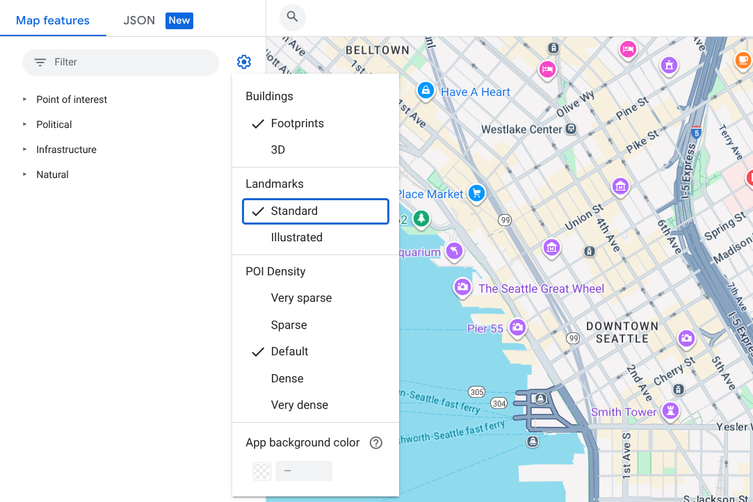Um mapa do centro de Seattle mostrando ícones padrão de PDIs do Google: um pequeno ícone branco em um glifo de ícone azul-petróleo em forma de gota sobre pontos de referência como o Museu de Arte e a Torre Smith.