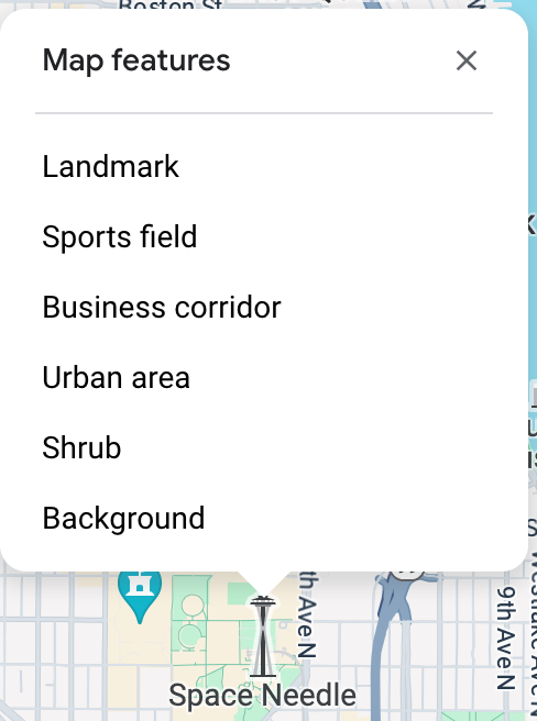 मैप इंस्पेक्टर, Space नीडल के ऊपर खुलता है और उस क्लिक पॉइंट पर छह मैप फ़ीचर की सूची बनाता है: लैंडमार्क, खेल का मैदान, बिज़नेस कॉरिडोर, शहरी इलाका, झाड़ी, और बैकग्राउंड.