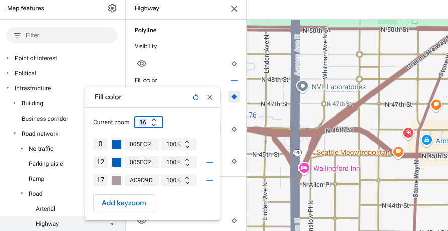 La même carte de Seattle, mais avec des styles de niveau de zoom ajoutés à 12 et 17 afin que les couleurs de l&#39;autoroute bleue se fondent dans la surface beige.