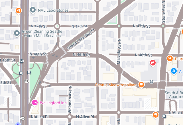 El mismo mapa de Seattle con un nivel de zoom 17, en el que todas las rutas ahora son de color beige porque cambiaron a la función de mapa de superficie.