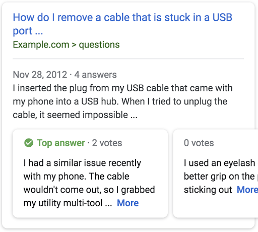 an example search result for a page titled 'How do I remove a cable that
            is stuck in a USB port' with a list of the top answers from the page.